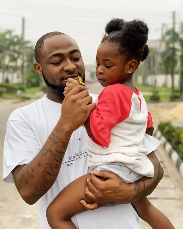 Davido Carrying His Daughter, Imade Adeleke, In Adorable Photo